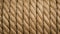 Rotation coil brown color in form of spiral closeup. Rope background for design