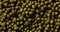 Rotation green mash beans texture background, Dry mash beans grains pattern