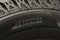 Rotation-inscription with an arrow or pointer on the sidewall of the new tire. The direction of rotation for correct installation