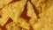 Rotation macro nacho chips, Background of Corn Tortilla Chips or Nachos