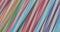 Rotation of multicolored plastic cocktail straws