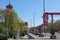 He Rotes Rathaus behind the trees and pink pipes at Alexanderplatz in Berlin, Germany