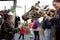 A Rothschild Giraffe is fed by children