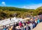 ROTORUA, NEW ZEALAND - OCTOBER 10, 2018: Crowds sitting to watch daily eruption of Lady Knox Geyser in Wai-o-Tapu