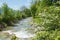 Rottach river, pictorial spring landscape tourist resort Rottach-Egern, upper bavaria in may