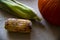 Rotten corn on the table next to the pumpkin