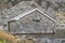 Rotten cottage at Ogwen valley with Llyn Ogwen in Snowdonia, Gwynedd, North Wales, UK - Great Britain, Europe