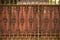 Rotten fence surrounding a house in the city