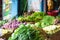 Rotten leaf lettuce on a display stand of a vegetable stall