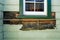 Rotten weatherboards being replaced on an old wooden Kiwi villa or bungalow