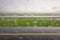 Rotterdam airport runway on a rainy day, background.