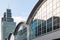 Rotterdam cruise terminal arch windows against blue sky