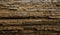 Rotting wood, texture of the old spoiled wood damaged, brown warm color. Abstract background. Natural wooden texture