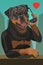 Rottweiler dog calls on the phone they love him