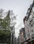 Rouen, Normandy, France - traditional townhouses and a church.