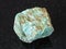 rough Amazonite stone on black