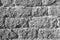 Rough brick wall in black and white