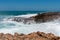 Rough coast line wave spray at Quobba Blow Holes Western Australia