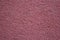 Rough and grainy reddish wall concrete texture
