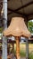 Rough Hessian Material Lamp Shade On Wooden Stand