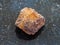 rough limonite (iron ore) stone on dark