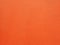 Rough orange concrete wall painted abstract background