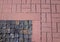 Rough pavement texture, old gray granite and red tiles