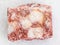 rough pink Aventurine stone on white marble