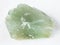 rough Prase (green quartz) stone on white