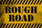 Rough Road sign yellow with stripes