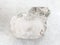 rough rock-crystal of quartz gemstone on white