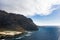 Rough rocky cliffs on the island of Tenerife.Black beach on the Canary Islands. Rocks, volcanic rock, Atlantic Ocean