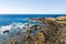 Rough rocky cliffs in the North of Tenerife.Black beach in the Canary Islands. Rocks, volcanic rocks, Atlantic ocean