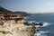 Rough rocky coast with rugged sharp cliffs and strong current in North-West of Fuerteventura, Canary Islands, Spain