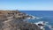 Rough and rocky landscape of the coastal walking path from Montana Amarilla to Amarilla Golf and Golf Del Sur, Tenerife, Spain