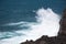 Rough sea shore with waves chrashing against the black lava rocks