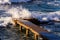 Rough Sea Waves Crashing On Old Pier