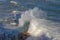 Rough Sea Waves Crashing Over a Pier, mediterranean sea, ligurian coast, Italy.