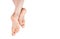Rough skin on soles of feet. dry heels, dry chapped skin on feet requiring care. Dry and cracked soles of feet. female legs in an