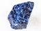 Rough Sodalite gemstone on white