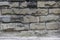 Rough stone brick wall tile texture, Rough outdoor decorative slate. Masonry mixed block