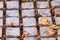 Rough stone cobbles covered with dead leaves