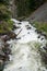 Rough stormy river in rocky mountains