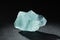 Rough Uncut Pale Blue Aquamarine Gemstone on Black