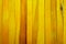 Rough yellow theme wooden partition wall texture background.