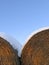 Round bales with snow