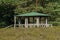 Round barbecue pavilion with green roof