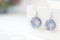 Round beaded earrings blue color