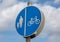 Round blue sign indicating lane markings for cyclists and pedestrians new brighton wirral august 2019