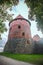 round brick tower of an old fortress